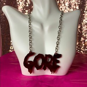 Red acrylic GORE necklace